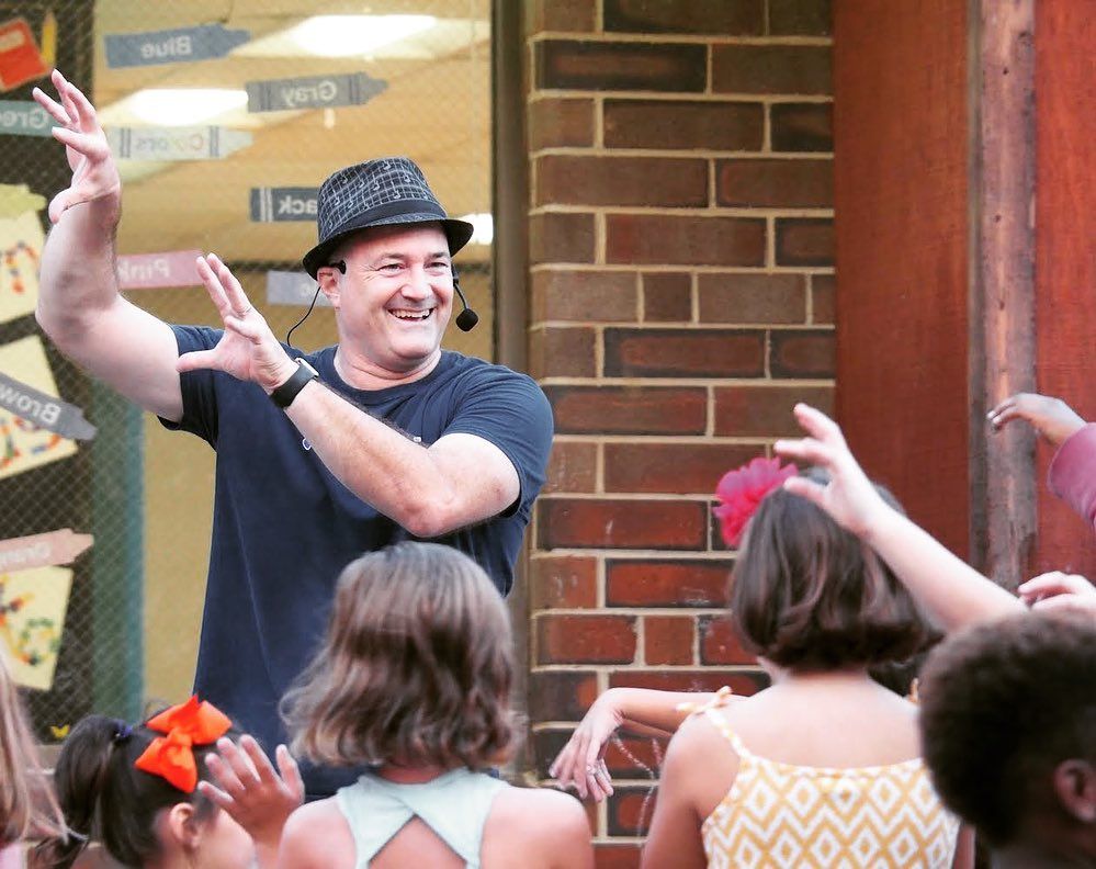 Music Instructor leading singalong songs